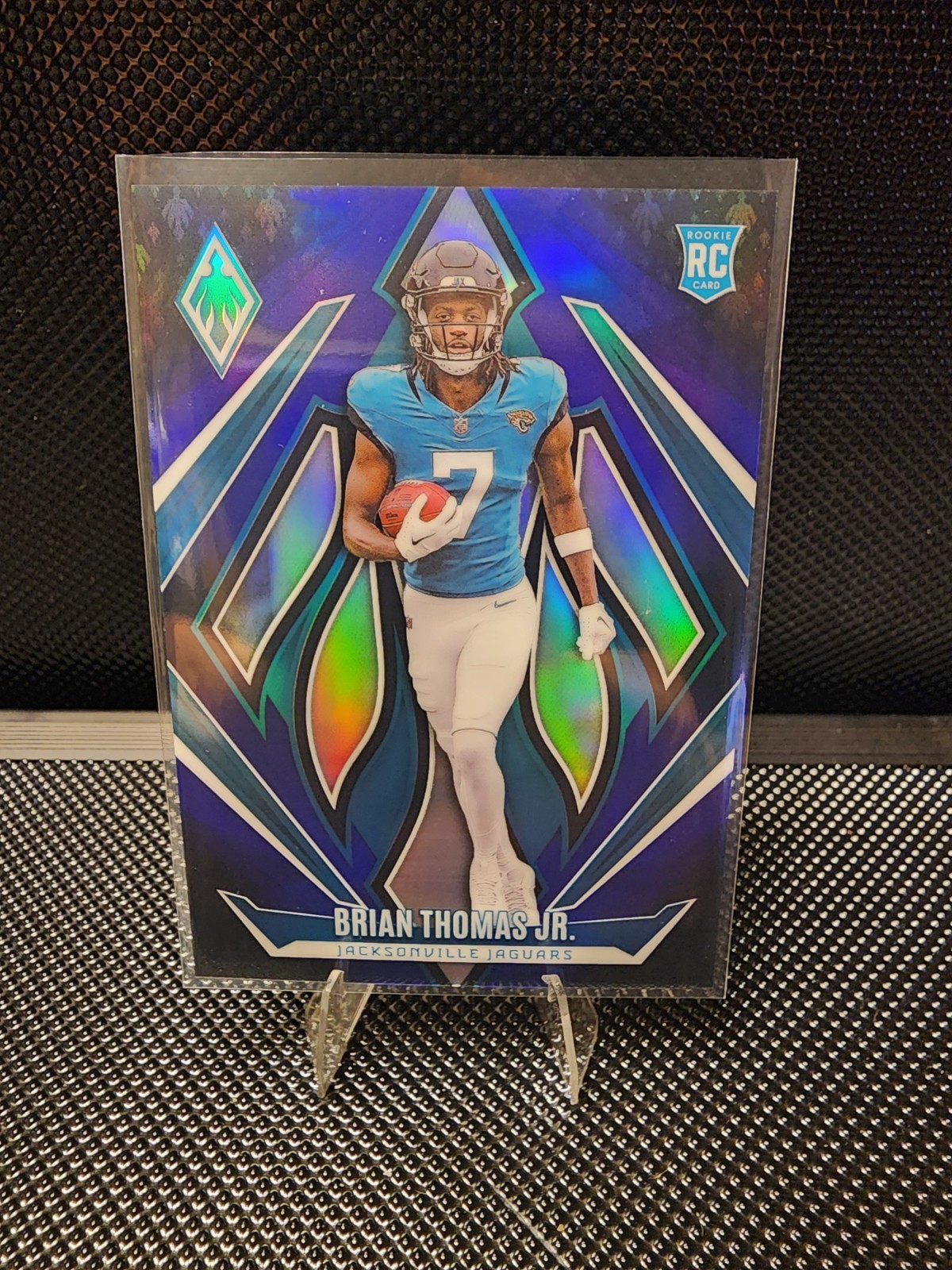2024 Panini Phoenix - Rookies Brian Thomas Jr. #164 Blue Fade /249 (RC)