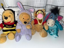 Disney Mini Bean Bag Pooh Collectibles. Great Condition with tags.