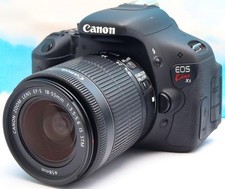 Canon EOS Kiss X5 Digital SLR Camera 18MP with Accessories and Guides