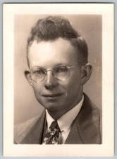 Vtg B&W Snapshot Handsome Man With Round Glasses Suit And Patterned Tie 1948