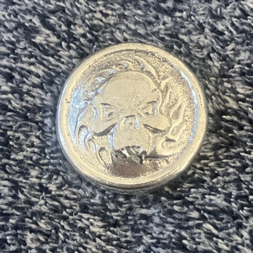 Hand Poured Silver Skull Shield 1.5 Ozt Toxic Bullion Pour