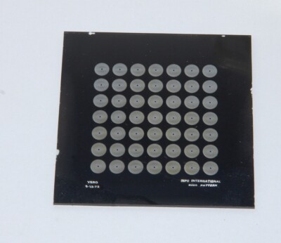 RESOLUTION/DISTORTION TEST PLATE 2.5'' SQ. 7x7 ARRAY OF CONCENTRIC RING SETS, NEG