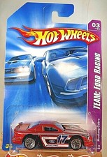 2008 Hot Wheels 143 Team Ford Racing 34 Mustang Cobra Orange Wlace Spokes