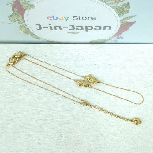 Collana lunga Givenchy colore oro usata dal Giappone