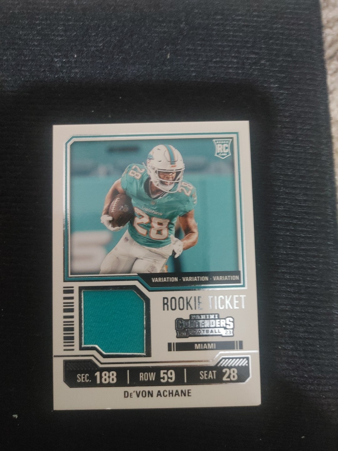 2023 Contenders - Rookie Ticket Swatches De'Von Achane #TS9V Variations (RC)