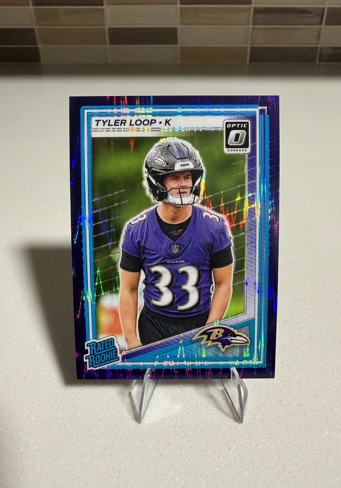 2025 Panini Donruss Optic - Rated Rookie Tyler Loop Ravens Purple Shock Prizm