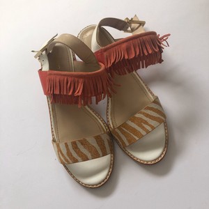 red fringe flat sandals