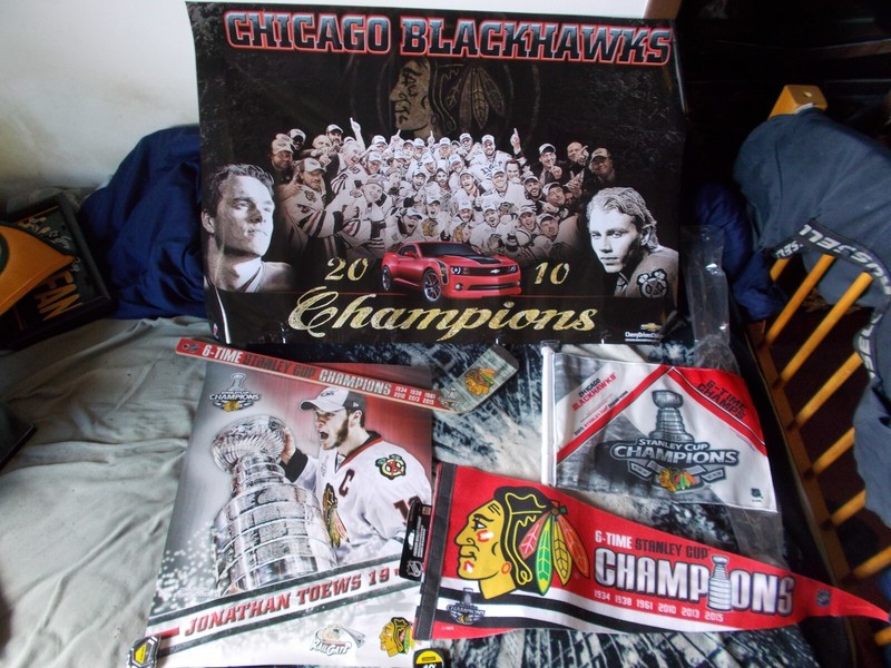 Blackhawks merchandise: 2 flags, 2 2010 posters, brand-new champion hockey stick