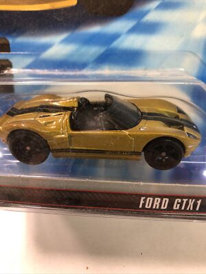 Hot Wheels Speed Machines Ford GTX1 Gold With Black Stripe ￼R8488