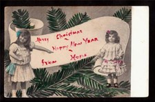 c1912 hand tinted girls in dresses Christmas & Happy New Year postcard