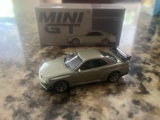 Mini GT #697 Millennium Jade Nissan Skyline GT-R R34 Tommykaira R-z