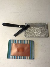 Two ID, Debit Card, Bill Carrying Wallets