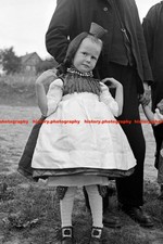 F012866 Girl Standing in the Grass Western Hessian Array Schwalm Germany 1930s