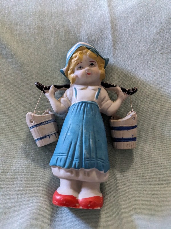 6" Dutch girl hold pail rack with 2 pails. Made in Japan stamped on her back