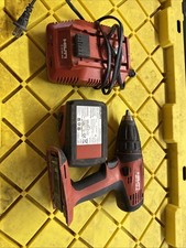 Hilti drill set with single battery charger and 5.2 amp battery