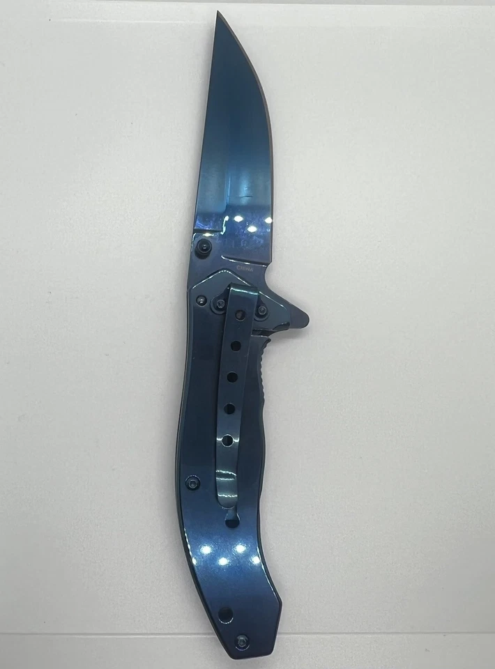 CUCHILLO DE APERTURA ASISTIDA POR RESORTE 4,5” ARCO IRIS ACABADO TITANIO HOJA DE ACERO INOXIDABLE Foto 4 de 4