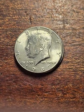 1987-D kennedy half dollar Nifc