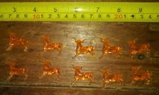 Retro vintage animal prize trinkets orange plastic cattle bull miniatures prizes