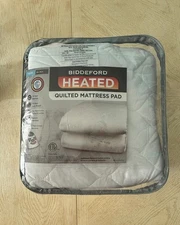 White heated mattress cover