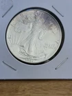 Better Date 1990 American Silver Eagle 1 Troy Oz .999 Fine Silver W.Toning