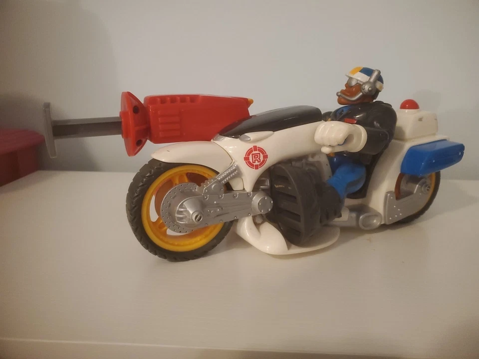Figura de acción Fisher Price Rescue Heroes Jake Justice 1998 bicicleta de policía de colección Foto 2 de 4