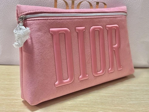 Pochette pochette Dior rose taille 16x27,5x4cm avec boite état neuf/occasion