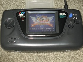 Sega Game Gear Set: Console, TV Tuner, Case, Battery Pack, Power Supply, 2 Games