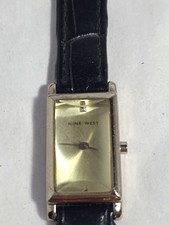 Nine West Women’s Quartz Analog Rectangle Watch Silver Dial Black Leather Strap