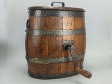 Antique wooden barrel butter churn with a crank handle
