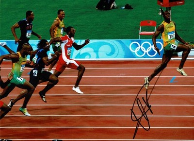 Jamaikanische Sprintlegende Usain Bolt signiert 16x12 Rennfoto + Händler Echtheitszertifikat