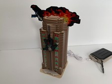 Hans Gruber Falling off Nakatomi Plaza Die Hard Advent Calendar 25 on top