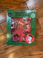 4 Metal Brain Teaser Puzzles - New In box