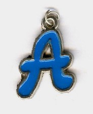 "A" enamel letter charm or pendant.