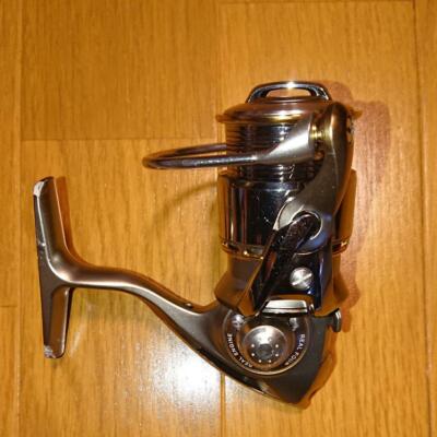 Daiwa EXIST 2004 /Fishing spinning reel / Some scratches and