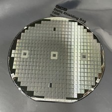4 Inch Silicon Wafer With Medium-Sized Iridescent Die And Black Backing