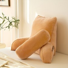 The Reading Pillow Has A Waist Support An Armrest And A Neck Support.