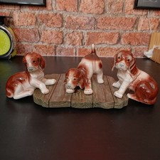 Three bone china dog figurines ornament set