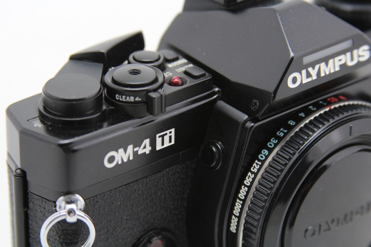 Olympus OM 4 Ti, vintage SLR camera & Zuiko lens Auto Zoom 35-70mm