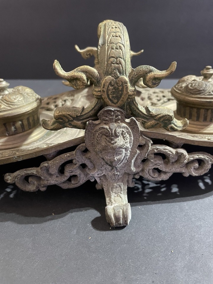 A genuine antique French cast brass double inkwell pen caddy — the kind of dramatic, museum-worthy desk object that stops people mid-conversation.