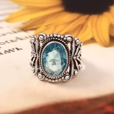 925 sterling silver jewelry ring with blue topaz gemstones...