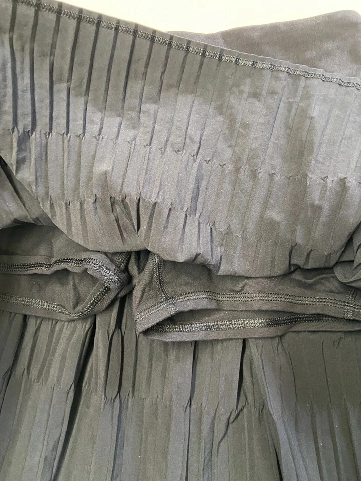 Pantalones Cortos Niñas IVIVVA Negros Forrados Sprint Completo Plisado Skort Talla 12 Foto 3 de 4