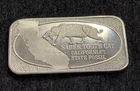 Rare vintage 1974  Saber Tooth Cat Tiger California Fossil USSC 1oz Silver bar