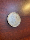 1886-O Morgan $1 – AU Circulated – Better New Orleans Semi-Key Date
