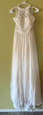 wedding dress size 6 David  s Bridal Ivory high neck halter gown. Never worn