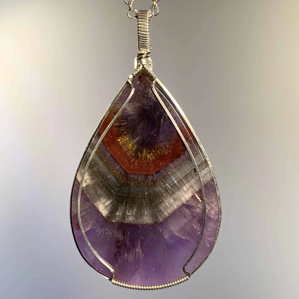 Super 7 Soulite pendant w red gold clear and purple