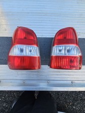MAZDA Demio 2000 GF-DW5W Left Raight Tail Light 