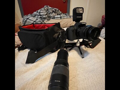 Canon EOS Rebel T5i / EOS 700D 18.0MP Digital SLR Camera - Black (Kit w/ IS STM