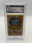 1999 Pokemon TCG Base Set 1st Edition Machamp 8/102 Holo Rare CGC 9 Mint WOTC