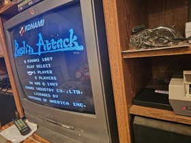 Lotto 5 giochi/manuali NES Jackal, Rush N Attack, QBert, Rad Racer, Foreman KO testati