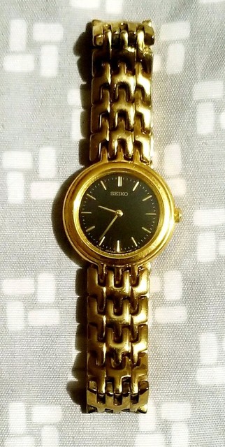 seiko gold black dial